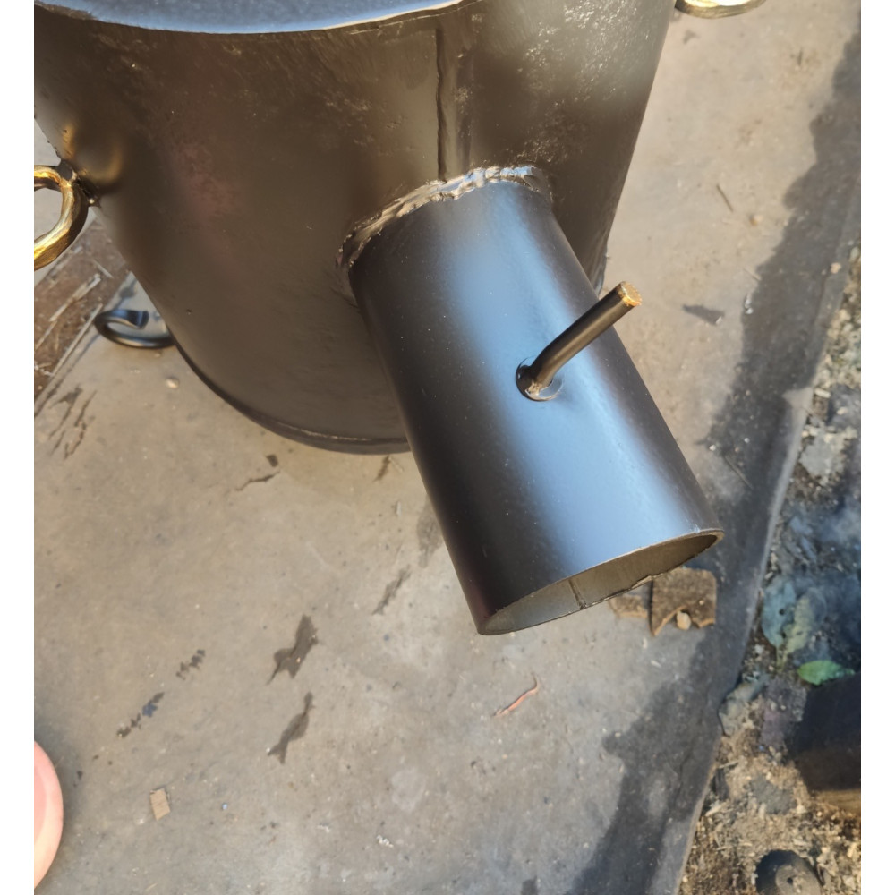 Буржуйка з чавунними кільцями опалювально-варильна